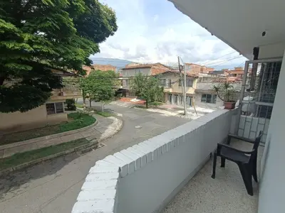 a balcony with a bench and a street at Acogedor Loft con Balcones para 2H Belén Rosales apt 201 in Medellín
