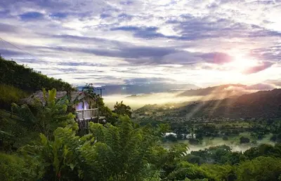 a house on a hill with a view of a valley at Saray glamping in Palestina