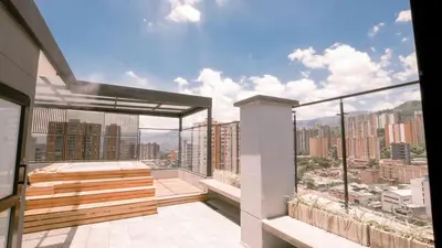 a balcony with a view of a city at Apartamento Premium Sabaneta in Sabaneta