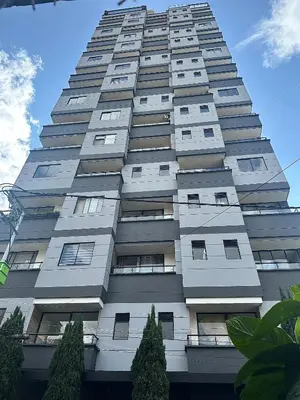 a tall building with many windows on it at Apartamento Premium Sabaneta in Sabaneta