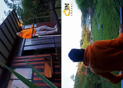 a person in an orange jacket on a zip line at Refugio Selvatico in Guatapé