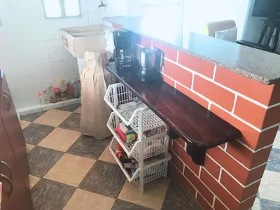 a kitchen with a counter and a sink and a counter at 