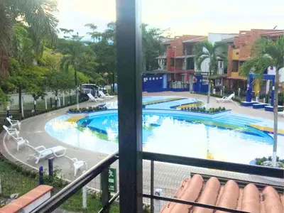 a view of a swimming pool from a balcony at 