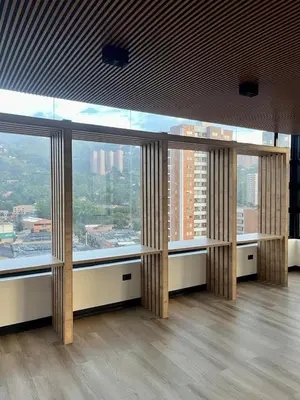 an empty room with large windows in a building at Apartamento exclusivo en Sabaneta, Antioquia in Sabaneta