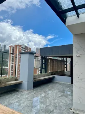 a balcony with a view of a city skyline at Apartamento exclusivo en Sabaneta, Antioquia in Sabaneta