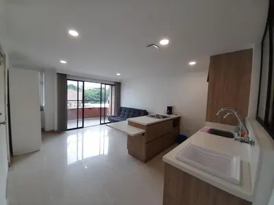a kitchen with a sink and a stove in it at Medellin laureles mejor ubicación in Medellín