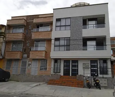 two motorcycles parked in front of a building at Hermoso aparta estudio en Medellin in Medellín