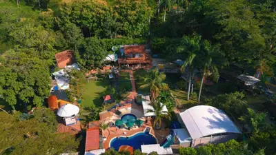 an overhead view of a house with a swimming pool at Eco Hotel El Acuario in San Jerónimo