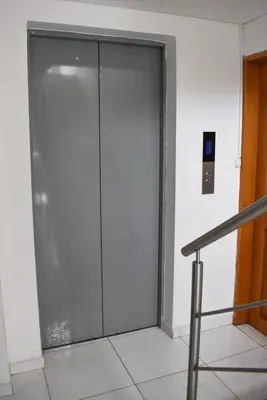a large glass door in a building at Cómodo apartament tipo loft en El Peñol in El Peñol