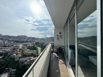 a balcony with a view of a city at Barcelona in Manizales