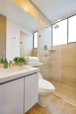 a bathroom with a toilet and a sink and a shower at The place you need in Poblado-Medellin 1103 in Medellín