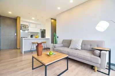 a living room with a couch and a table at The place you need in Poblado-Medellin 1103 in Medellín