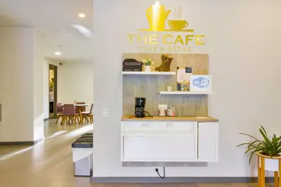 a coffee shop with a sign that reads take a break at The perfect stay in Medellín - 904 in Medellín