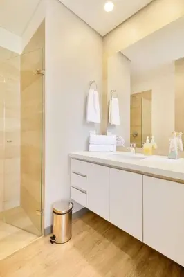 a white bathroom with a shower and a sink at The perfect stay in Medellín - 904 in Medellín