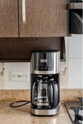 a coffee maker sitting on a kitchen counter at Luxurious Stay in Bello