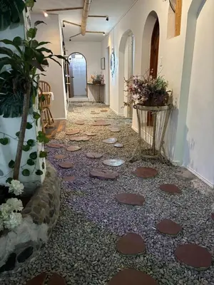 a hallway of a building with a tile floor at Casa Raizal in Envigado