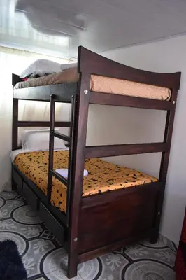 a set of bunk beds in a room at La posada de Martha in Marulanda