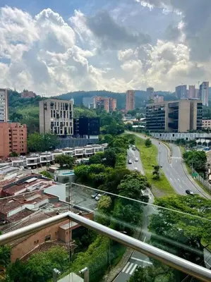 a view of a city with buildings and a highway at The place to stay in Medellin 802 in Medellín
