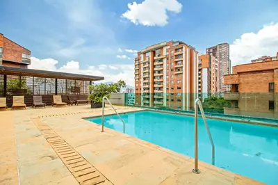 a swimming pool on top of a building at The place to stay in Medellin 802 in Medellín
