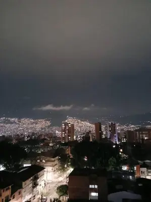 a view of a city at night with lights at Apto tipo Loft en Laureles Nutibara Increíble Vista in Medellín