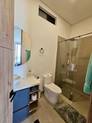 a bathroom with a toilet and a sink and a shower at Montecielo Lodge 41 - Jacuzzi y Vista Piedra Peñol in El Peñol
