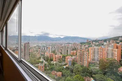 a view of a city from a window at Apto con la mejor vista del Edificio in Medellín