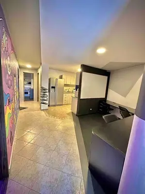 a room with a kitchen with a kitchenasteryasteryasteryasteryasteryasteryasteryastery at Colonial Charm House in Medellín