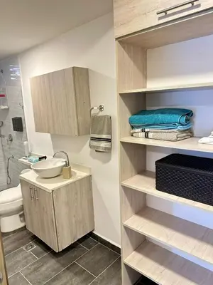 a bathroom with a sink and a toilet at Colonial Charm House in Medellín