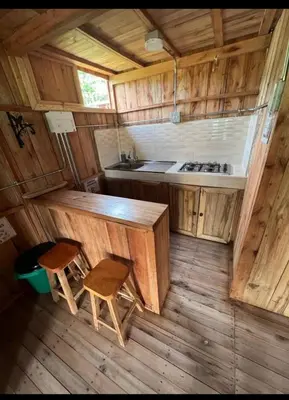 an overhead view of a kitchen in a tiny house at Cabañas Lucerito Colibrí in Jardin