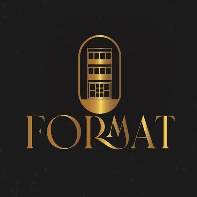 a gold logo for a hotel on a black background at Format one in Medellín