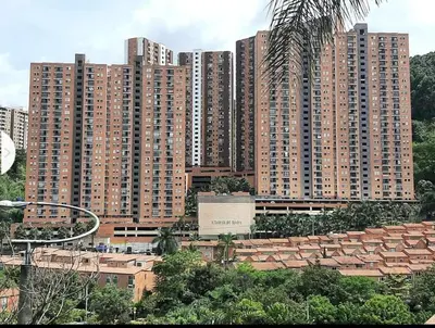 a group of tall buildings in a city at Habitacion confortable 1 persona in Medellín