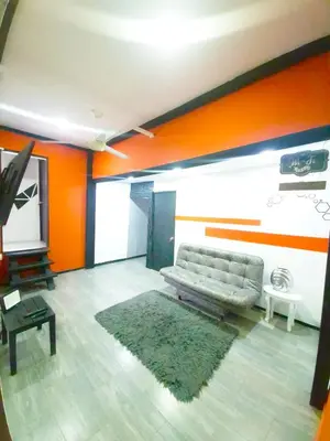 a living room with a couch and a table at Sunset Strip Suite # 301C ICON Lleras Park 301 in Medellín