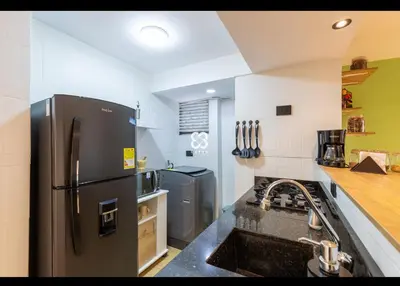 a kitchen with a stainless steel refrigerator and a sink at Apartamento amoblado en Medellin! Solo Alquiler mensual!!! in Medellín