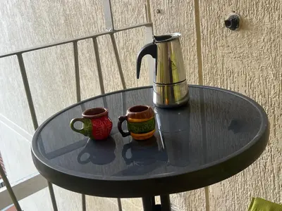 a table with two coffee mugs on top of it at Apartamento amoblado en Medellin! Solo Alquiler mensual!!! in Medellín