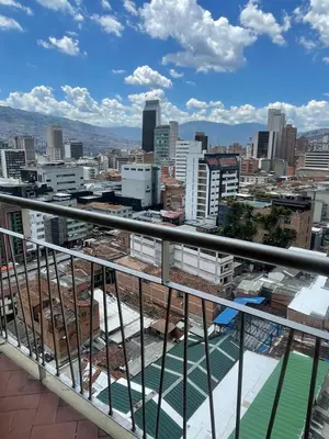 a view of the city from the roof of a building at Apartamento amoblado en Medellin! Solo Alquiler mensual!!! in Medellín