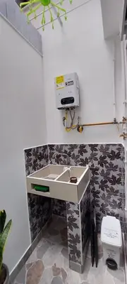 a bathroom with a sink and a toilet at Cómodo loft en Medellín in Medellín