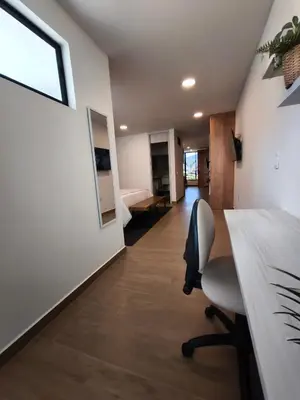 an office with a desk and a chair at Florentina Living 302 A in Medellín