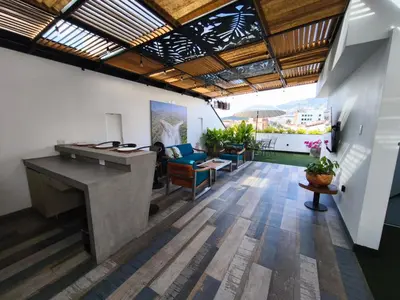 an office with a desk and chairs in a room at Florentina Living 401 in Medellín