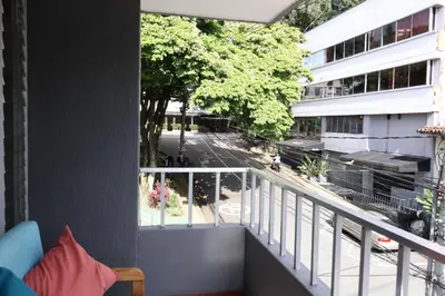 a balcony with a view of a street and a building at Living Poblado Manila 301 D Habitación Doble in Medellín