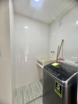 a kitchen with a stove and a sink in it at Apartamento familiar y de descanso in Rionegro