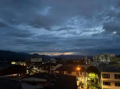 a view of a city at night at Open Sky in Manizales