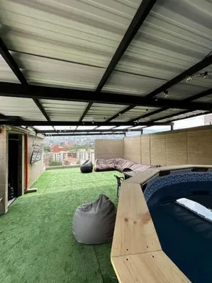 a covered patio with a skateboard ramp on the ground at Exclusivo apartamento con piscina y parqueadero 602 in Medellín