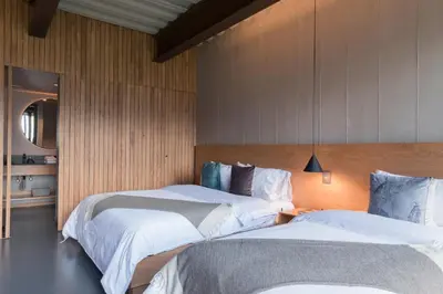 a room with two beds in a room at Zeta Erre Apartments in Medellín