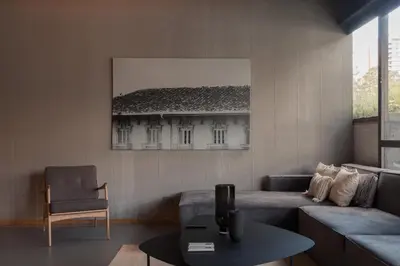 a living room with a couch and a table at Zeta Erre Apartments in Medellín