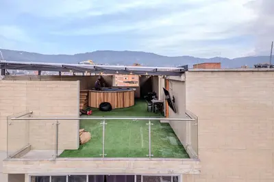 a view of a backyard on the roof of a building at Apartamento en laureles con piscina y parqueadero 402 in Medellín