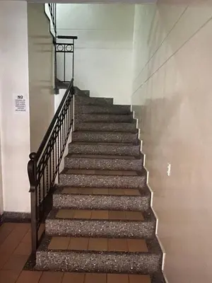 a stairway in a building with a stair case at Apartaloft in Sabaneta