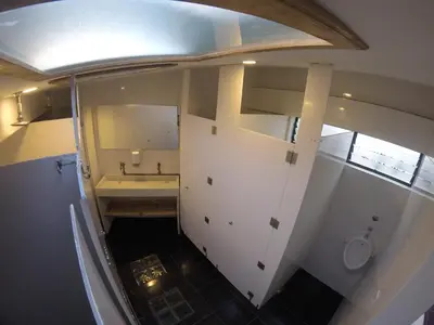 an overhead view of a bathroom with a sink and a toilet at Hostal de la 57 in Manizales