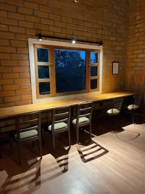 a room with a table and chairs and a window at Casa de Campo completa ubicada en Santa Elena in Santa Elena