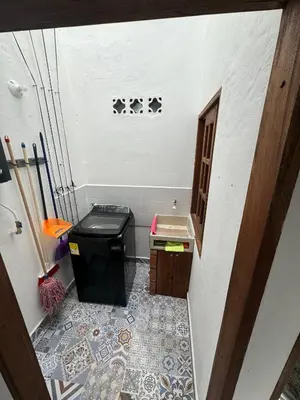 a small bathroom with a toilet and a tile floor at Apartamento acogedor cerca al parque con balcón in Jardin