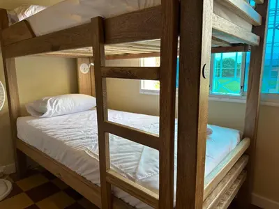 a couple of bunk beds in a room at Lucca Hostel Medellín in Medellín